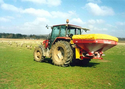 Tractor and fertiliser sower