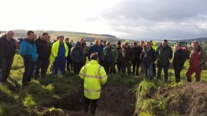 Gavin Elrick - soil & drainage expert, with his back to the photo, addressing a crowd of farms