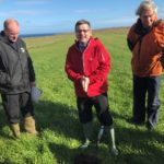 Gavin Elrick, soil & drainage expert from SAC Consulting, discussing soil health in a grassland field near Stornaway