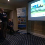 Donald Dunbar, agricultural advisor, giving a presentation to a room of farmers