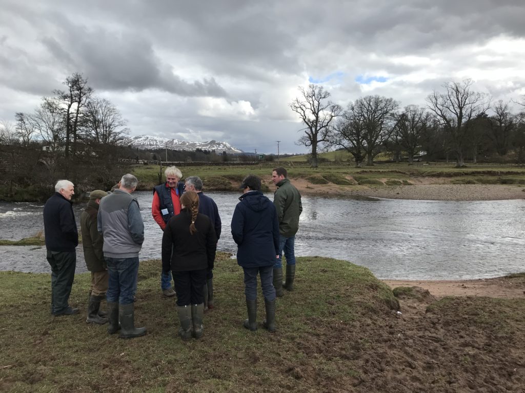 Farmers at the side of a riverbank near some significant poaching during the Drymen DP PC event