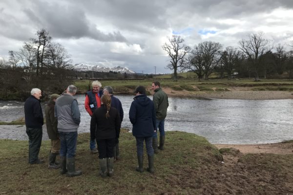 Farmers at the side of a riverbank near some significant poaching during the Drymen DP PC event