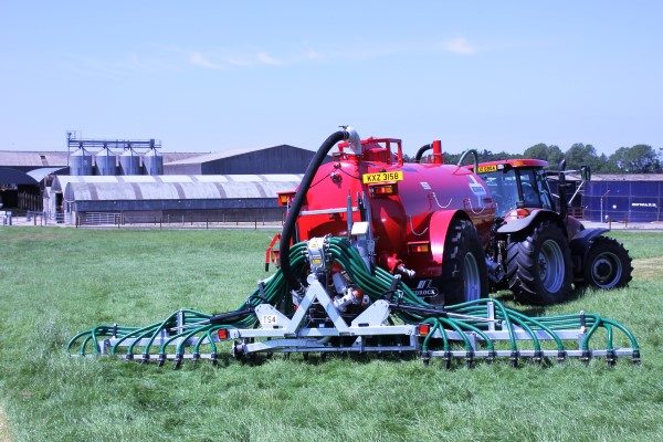 Tractor and tanker with a trailing shoe on the back