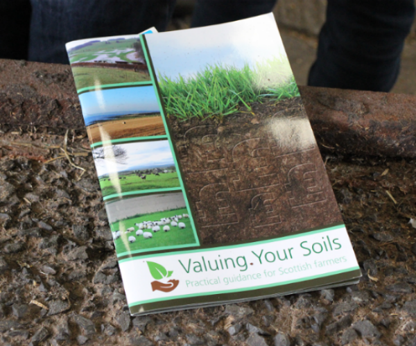 Photo showing the Valuing Your Soils Booklet on a concrete floor