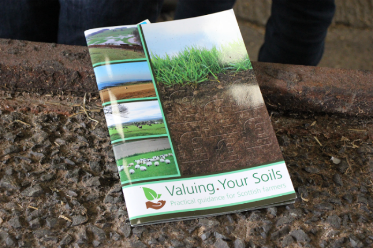 Photo showing the Valuing Your Soils Booklet on a concrete floor