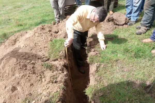 Gavin Elrick at Auchlossan examining soil profile