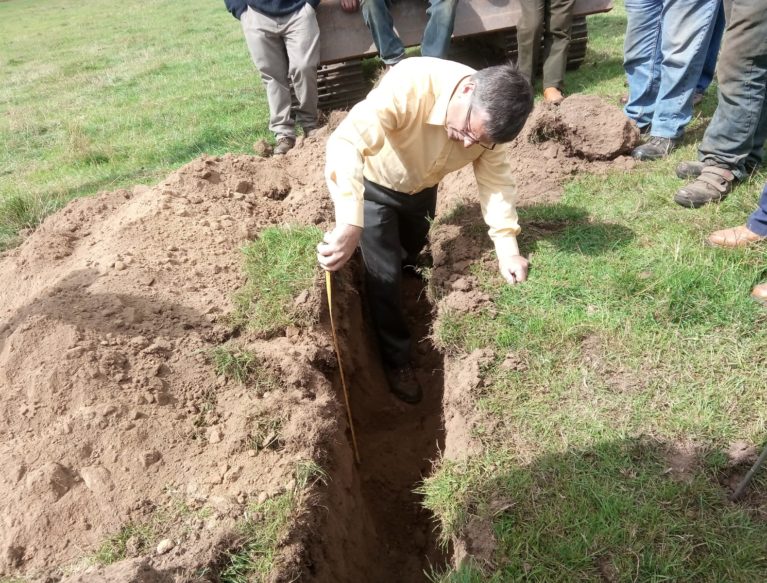 Gavin Elrick at Auchlossan examining soil profile