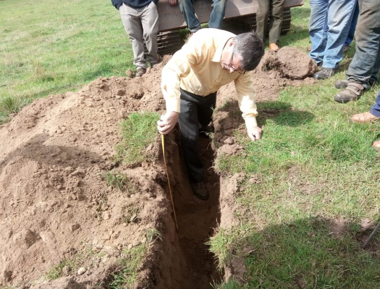 Gavin Elrick at Auchlossan examining soil profile