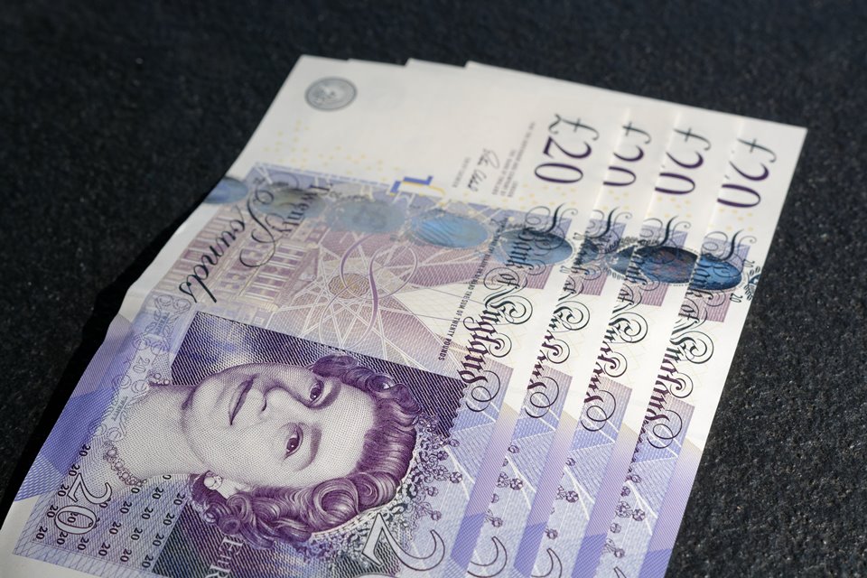 a close up of a ten pound note.