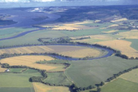 landscpe scene with winding river, crop and grassland fields, taken from a height and as shown on the cover of the Scottish Government's NVZ Guidance for Farmers booklet