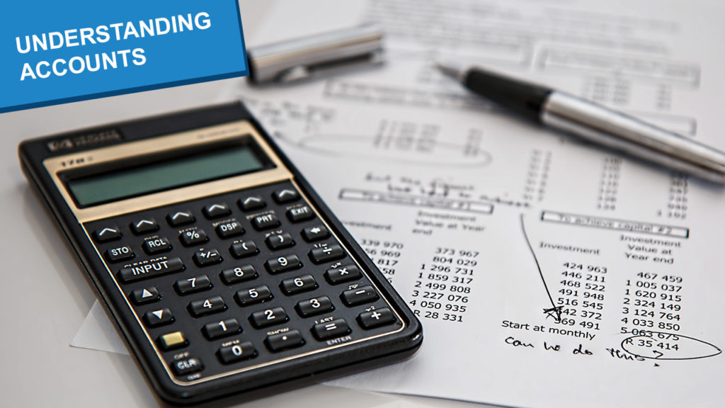 A calculator and financial documents, with the title 'understanding accounts'