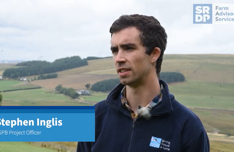 RSPB's Project officer, Stephen Inglis standing in an upland area within the Clyde Valley Wader Initiative area speaking to the camera.