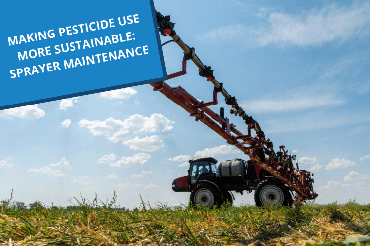 Looking upwards from ground level, this photo is of a self propelled sprayer with the boom open and ready to work on a grassland field.