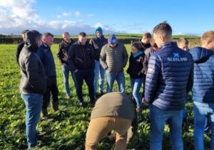 Group of farmers standing in a field