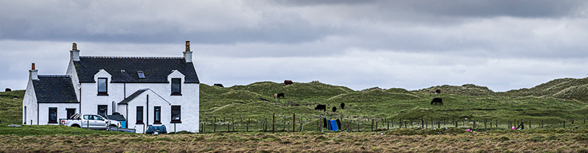 A white croft house on Tiree