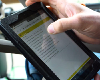farmer using tablet in tractor