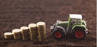Toy Tractor and pound coins