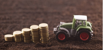 Toy Tractor and pound coins