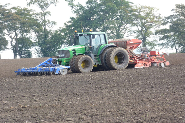 Tractor, seeder and discs