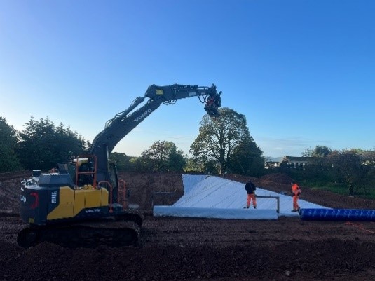 Digger digging a lagoon