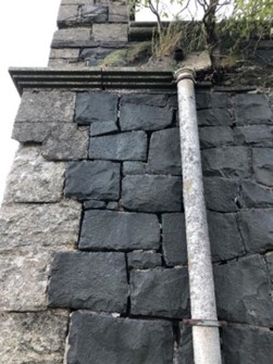 Figure 1: Gaps in stone exterior where bats could access.