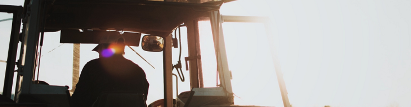 Man in Tractor Banner