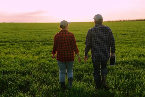 field-farmer-walking_shutterstock