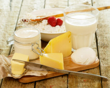 Board of cheese, yoghurt and milk