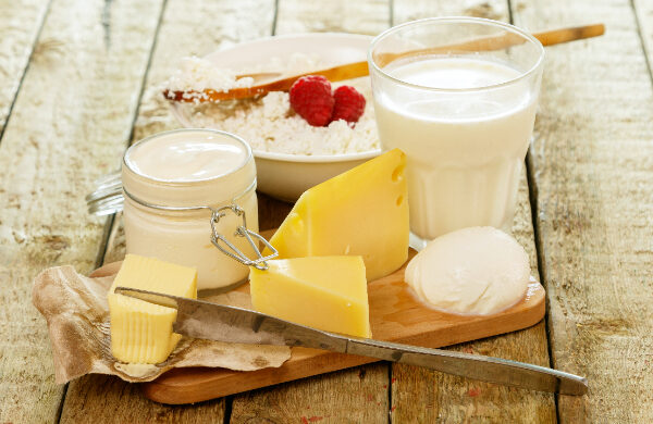 Board of cheese, yoghurt and milk
